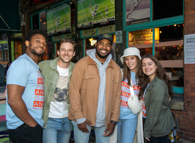 Bar crawlers pose for photos