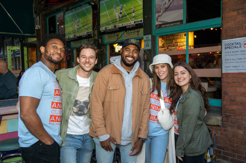 Bar crawlers pose for photos