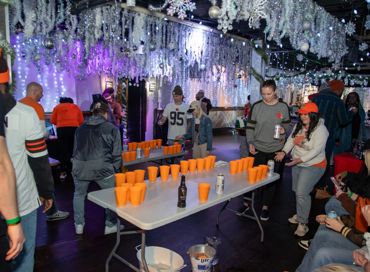 Bar plays beer pong at winter party