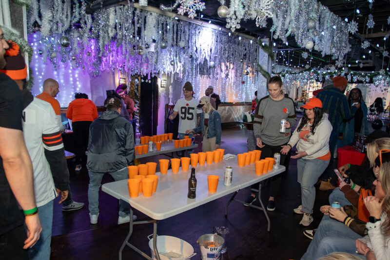 Bar plays beer pong at winter party