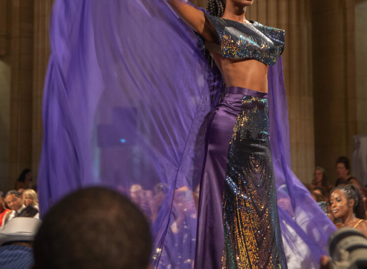 Cleveland model in flowy purple dress