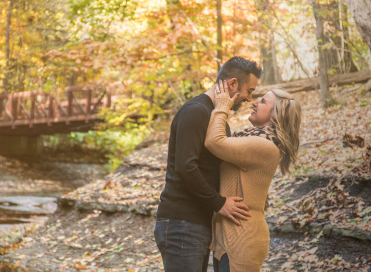 couple poses for engagement photos