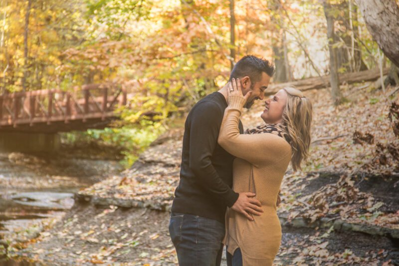 couple poses for engagement photos