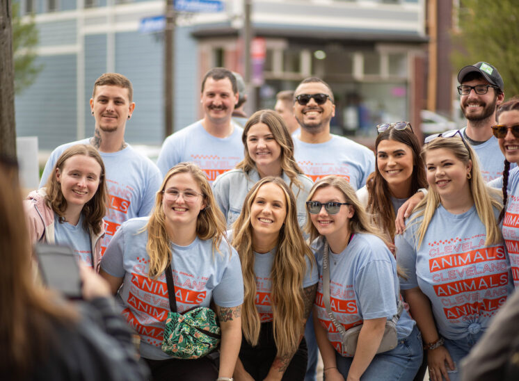 Crowd of bar crawlers pose for group photo