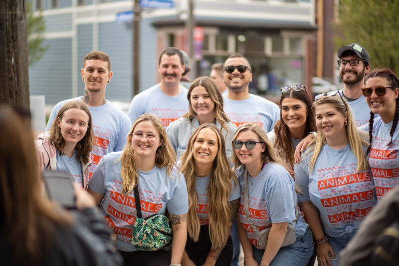 Crowd of bar crawlers pose for group photo