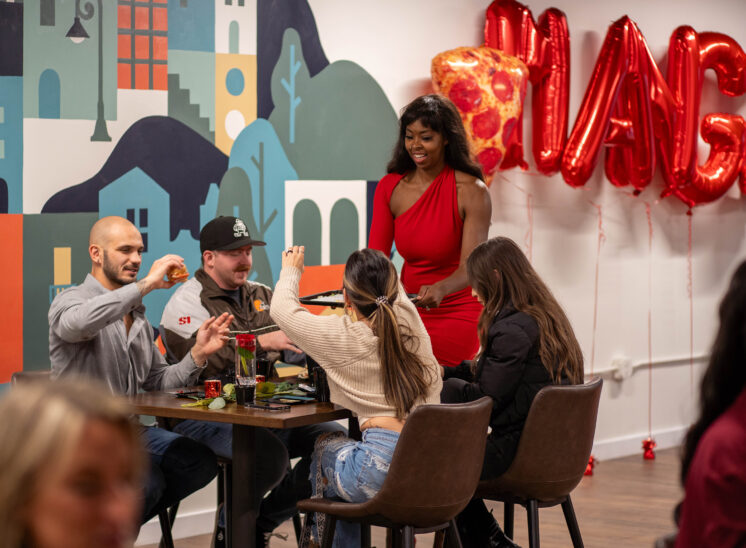 Diners reach for food at Cleveland party