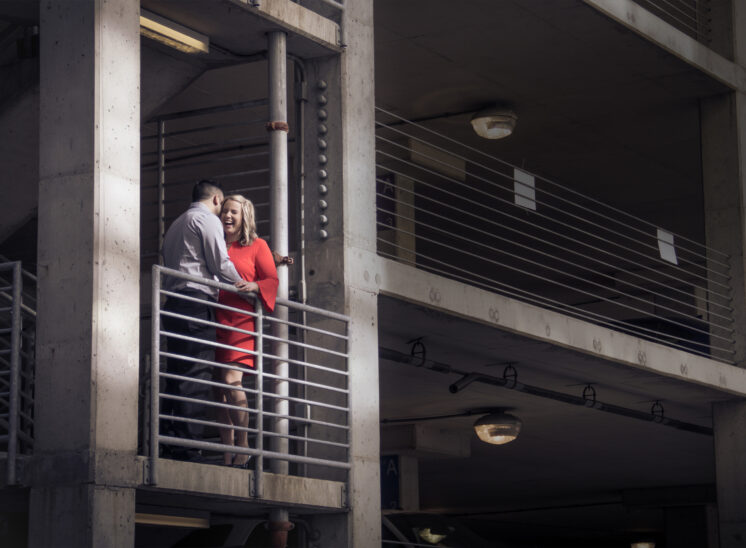 engaged couple laughing