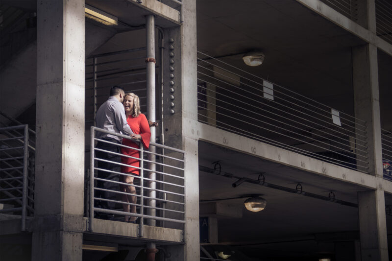 engaged couple laughing