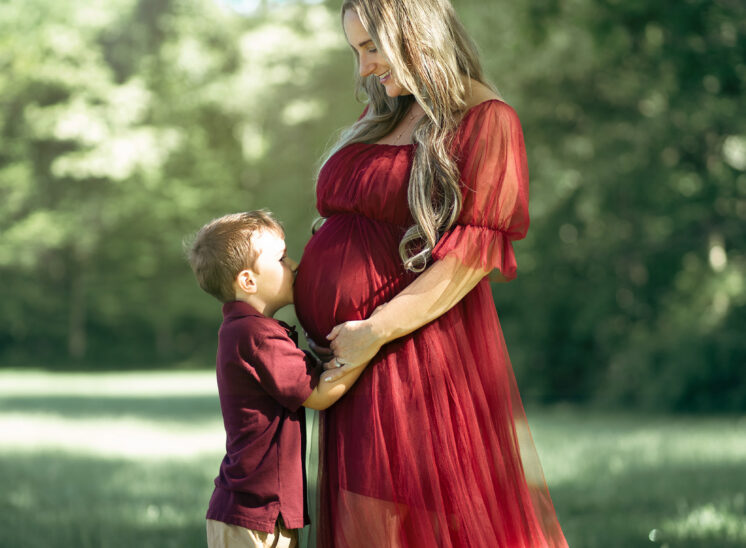 expectant mother and son during maternity shoot