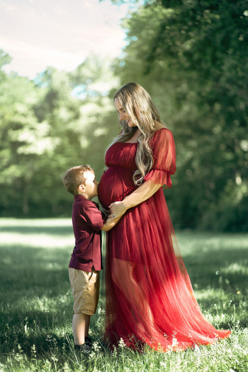 expectant mother and son during maternity shoot