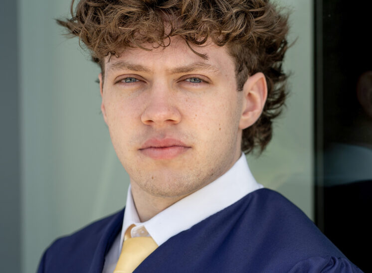 high school senior poses for senior photo