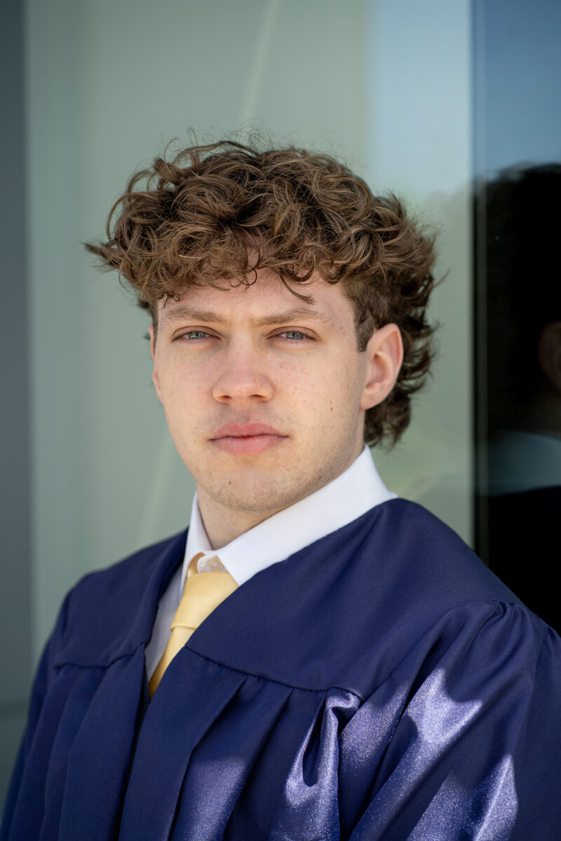 high school senior poses for senior photo