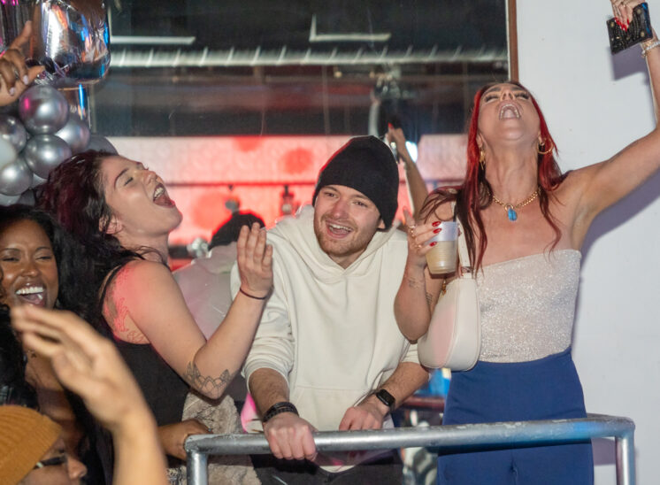 Patrons sing along in club