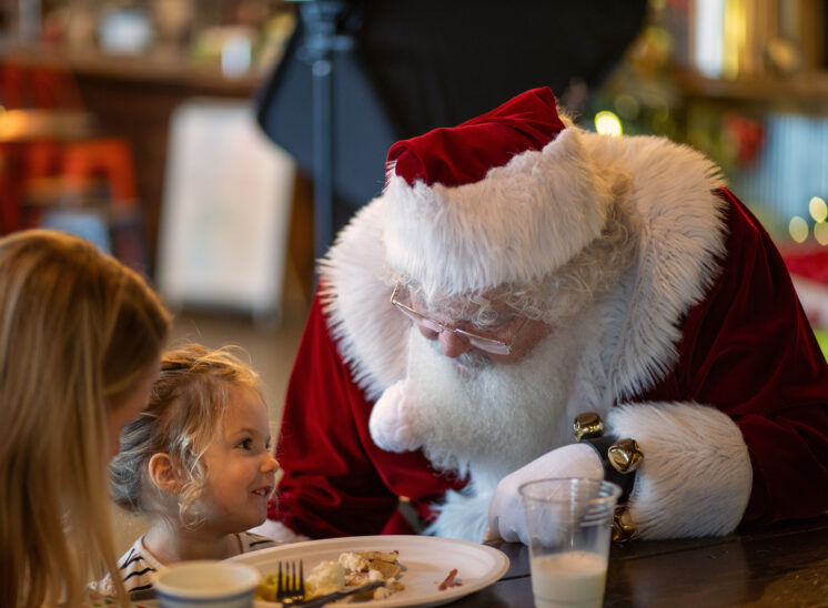 Santa talks with little girl