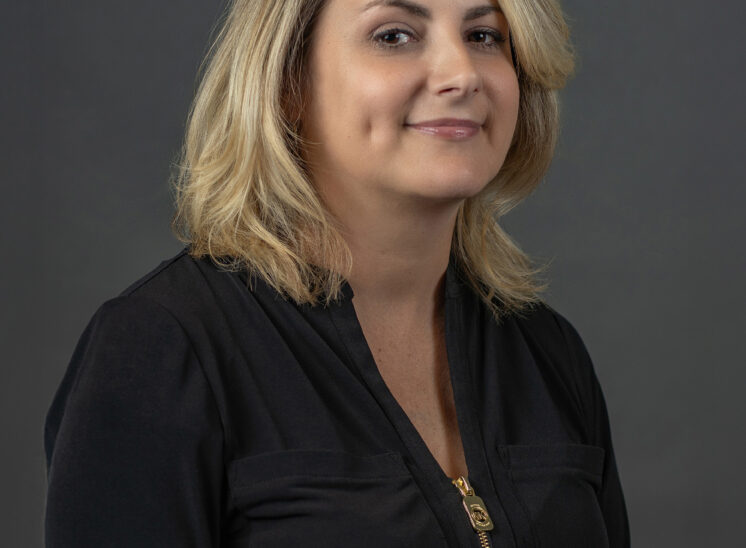 Woman poses for headshots in Cleveland