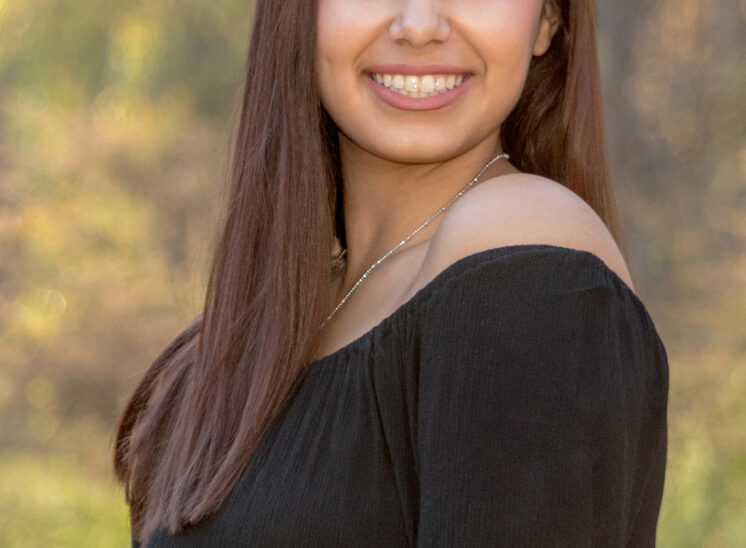 Senior smiles for photo
