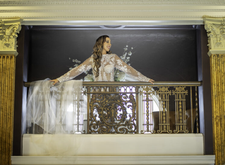 Bride-to-be looks from balcony at Cleveland photoshoot