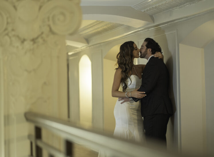 future-bride-and-groom-kiss-during-photoshoot