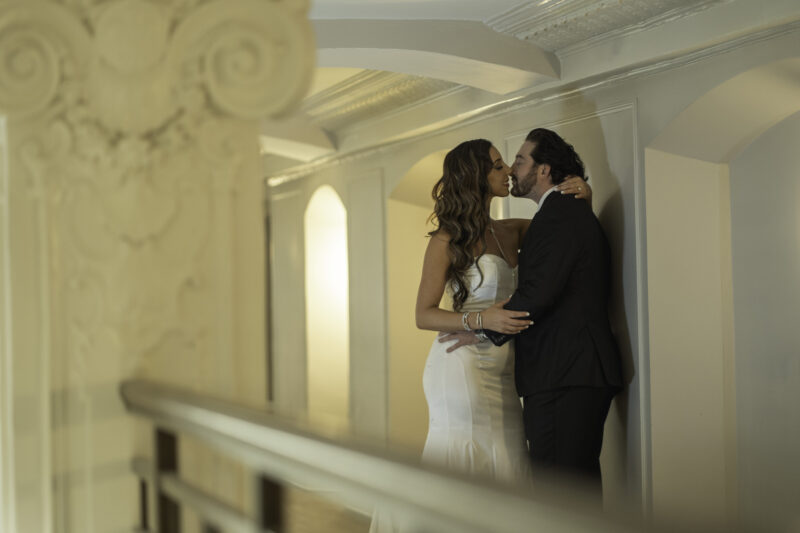 future-bride-and-groom-kiss-during-photoshoot